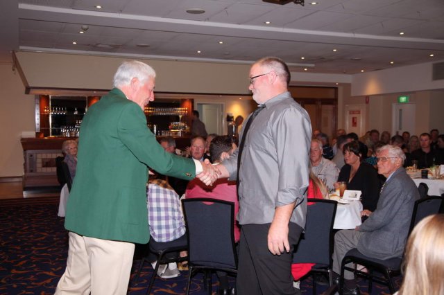 Craig Kelly receiving AA elite badge.JPG