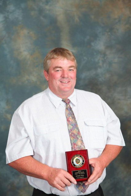 Gerard Hose with award.JPG