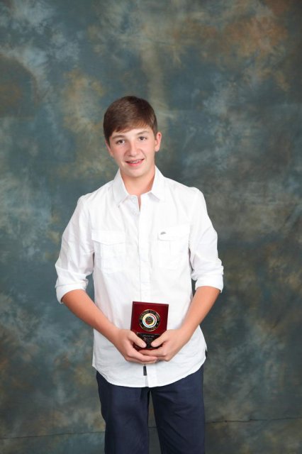 Mitchell Iles with award.JPG